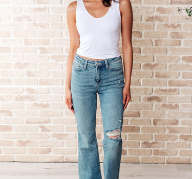 Isla Mid Rise Distressed Released Hem Bootcut Jeans