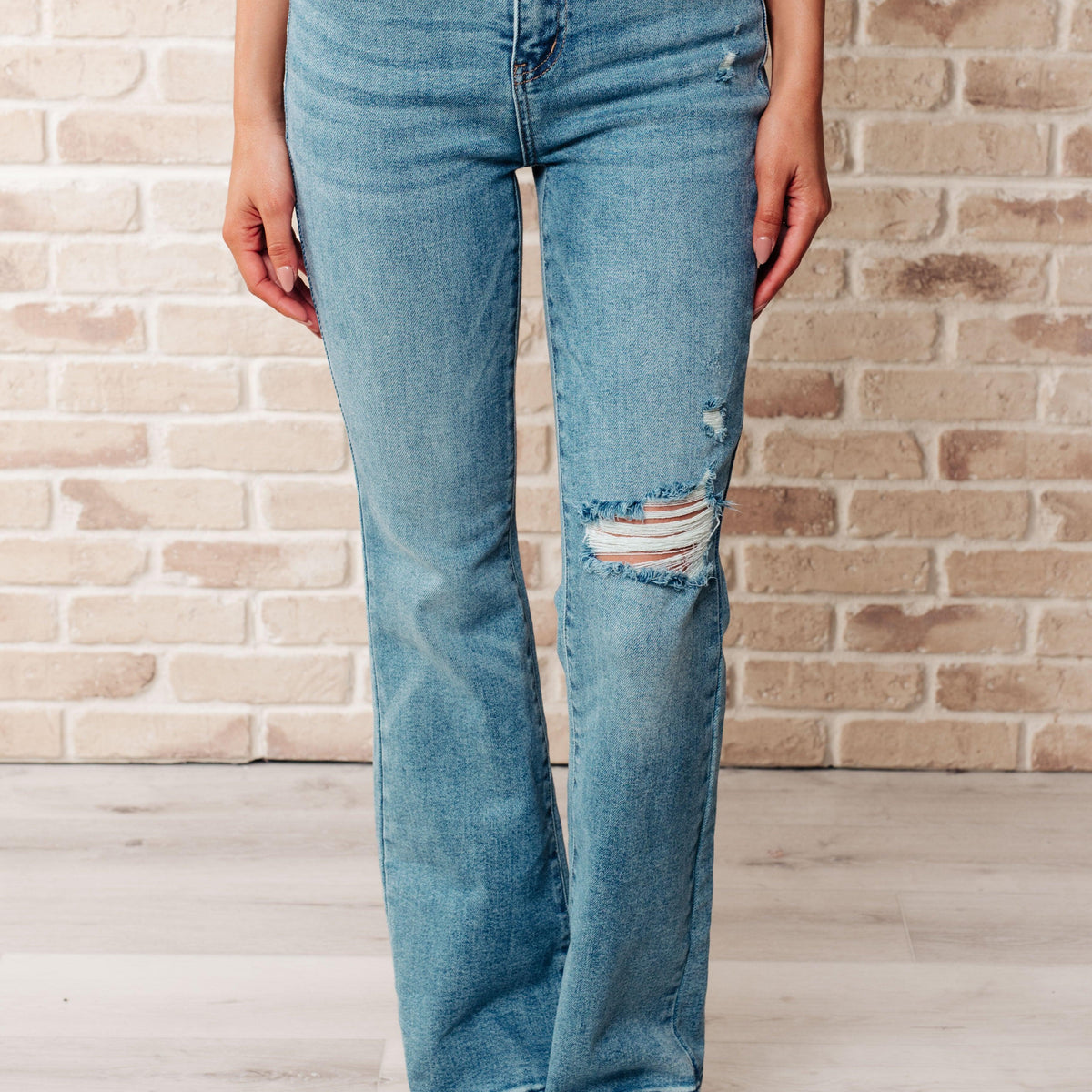 Isla Mid Rise Distressed Released Hem Bootcut Jeans - Three Mad Hatters Mercantile 
