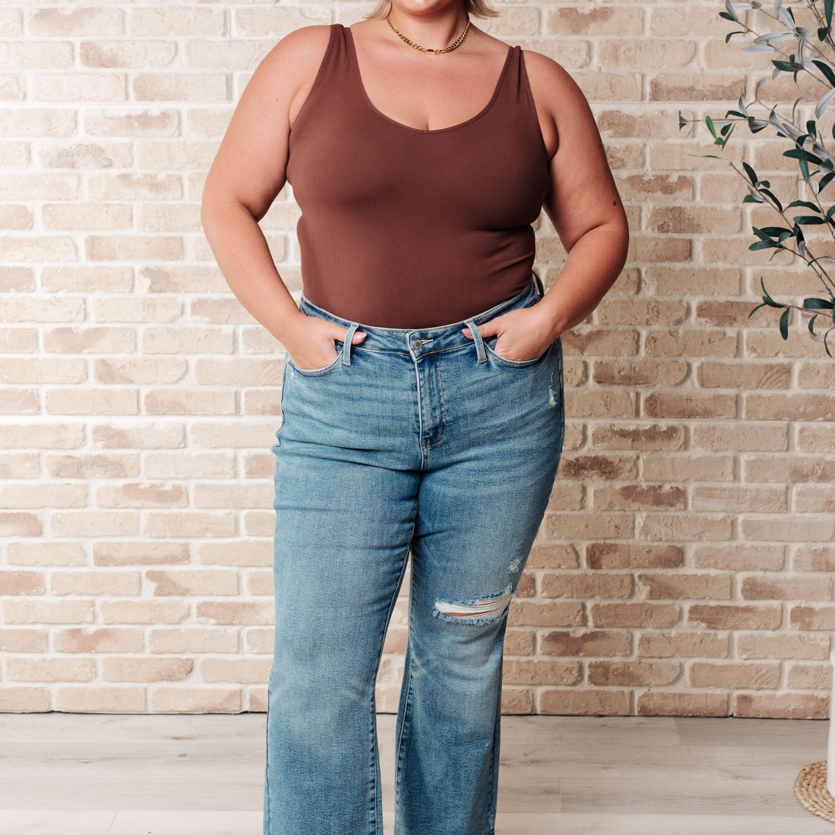 Isla Mid Rise Distressed Released Hem Bootcut Jeans - Three Mad Hatters Mercantile 