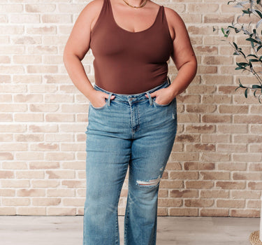 Isla Mid Rise Distressed Released Hem Bootcut Jeans