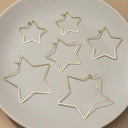 Trio graduate size star hoop earrings