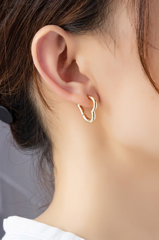 Heart shape hinged huggie hoop earrings    