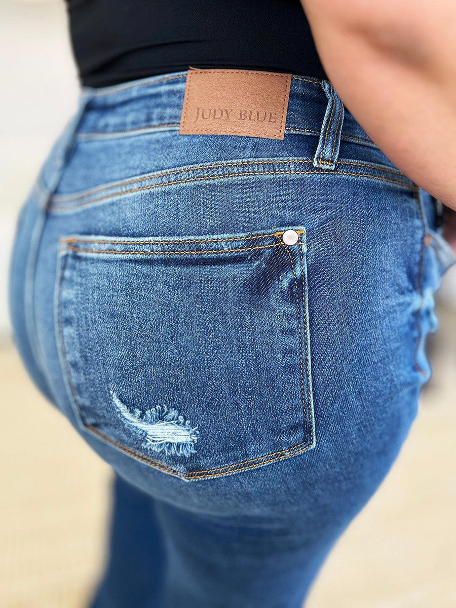 Judy Blue Full Size Mid Rise Distressed Raw Hem Jeans - Three Mad Hatters Mercantile 
