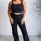 Building Habits Twill Flared Crossover Waist Pant in Black Bottoms   