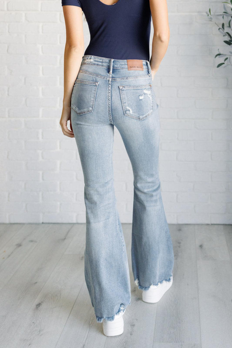 Caroline Mid Rise Control Top Distressed Flare Jeans - Three Mad Hatters Mercantile 