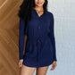 Getting Out Long Sleeve Hoodie Romper in Navy Jumpsuits & Rompers   