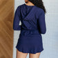 Getting Out Long Sleeve Hoodie Romper in Navy Jumpsuits & Rompers   