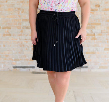 Just a Flirt Pleated Skirt in Black