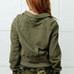 Under Her Spell Half Zip Pullover in Green Tops