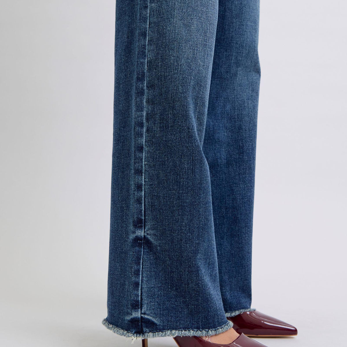 Judy Blue Raw Hem Mid Rise Jeans - Three Mad Hatters Mercantile 
