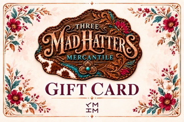 Three Mad Hatters Mercantile spring gift card with engraved copper concho and TMHM ranch mark